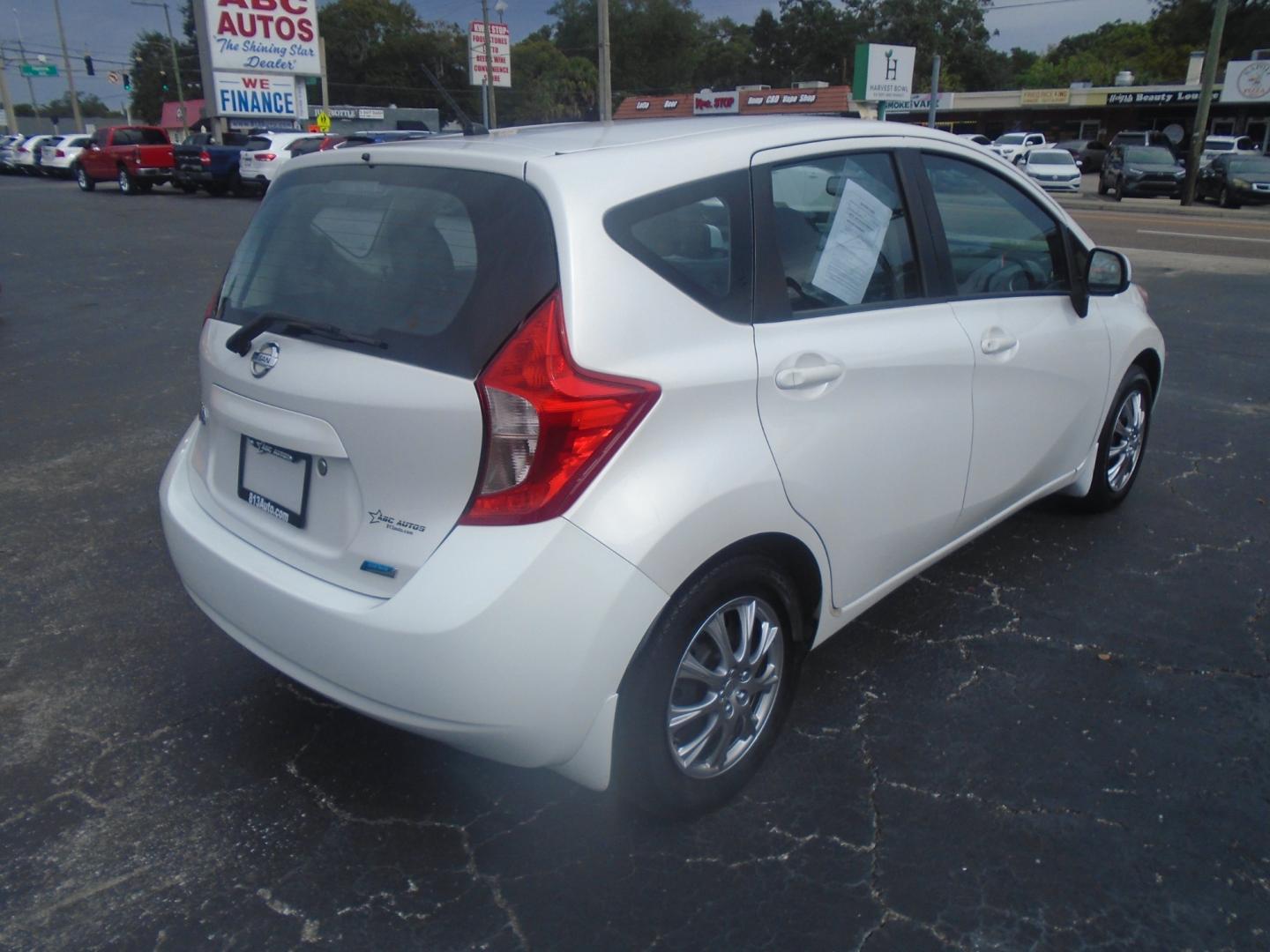 2014 Nissan Versa Note S (3N1CE2CP1EL) with an 1.6L L4 DOHC 16V engine, 5-Speed Manual transmission, located at 6112 N Florida Avenue, Tampa, FL, 33604, (888) 521-5131, 27.954929, -82.459534 - Photo#3